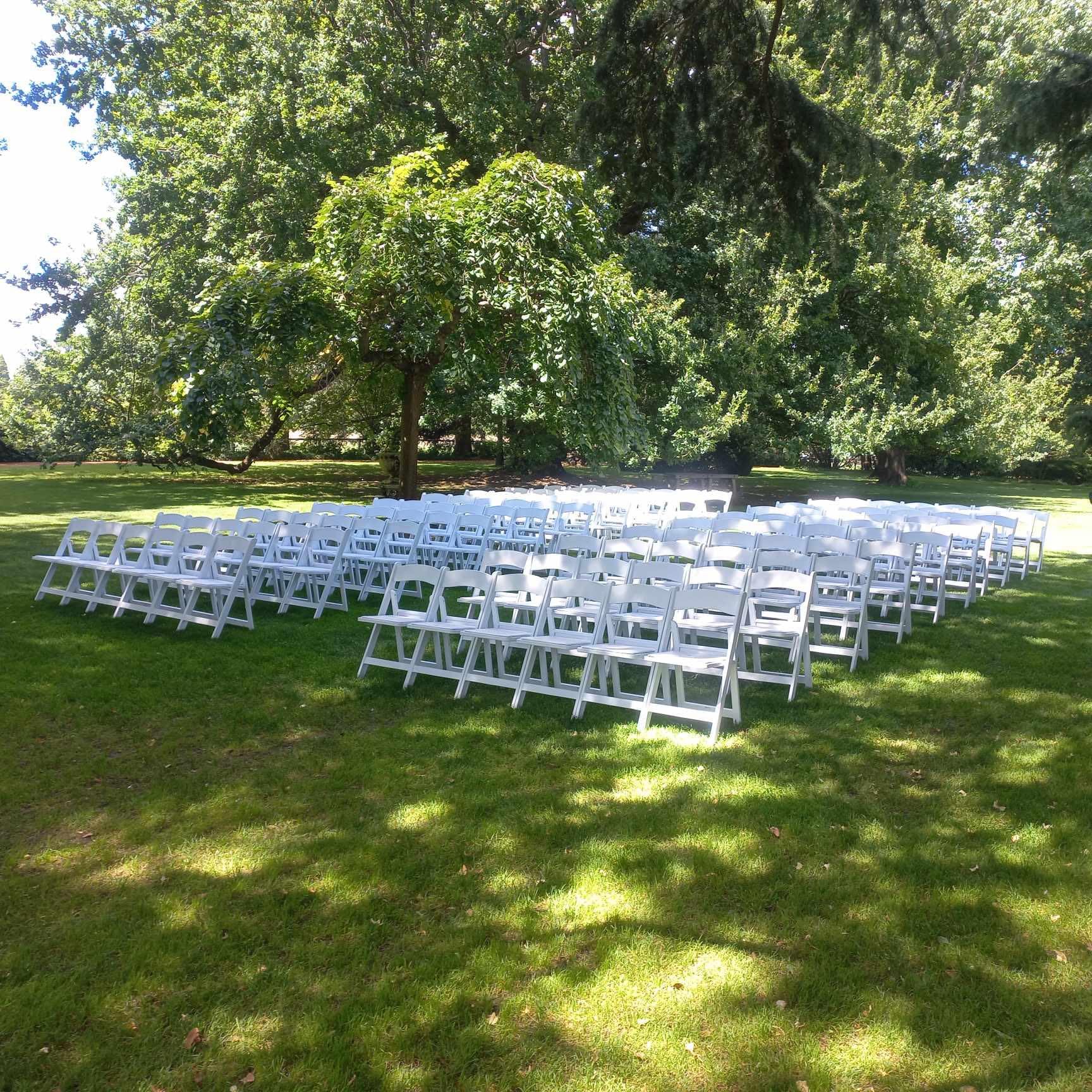 White padded folding chairs