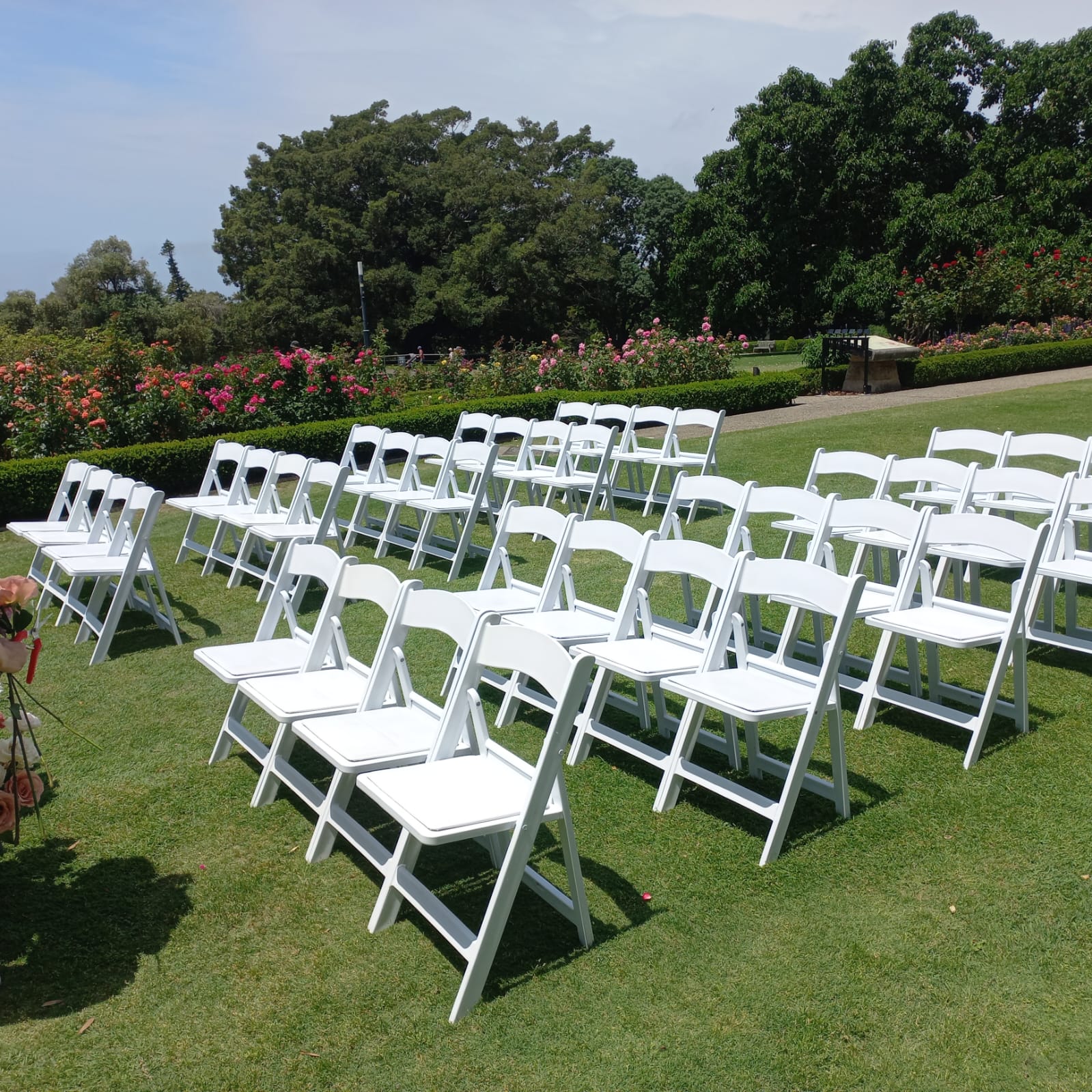 White padded folding chair outdoor event