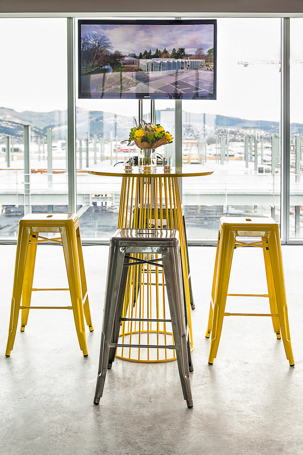 yellow cocktail table and stool