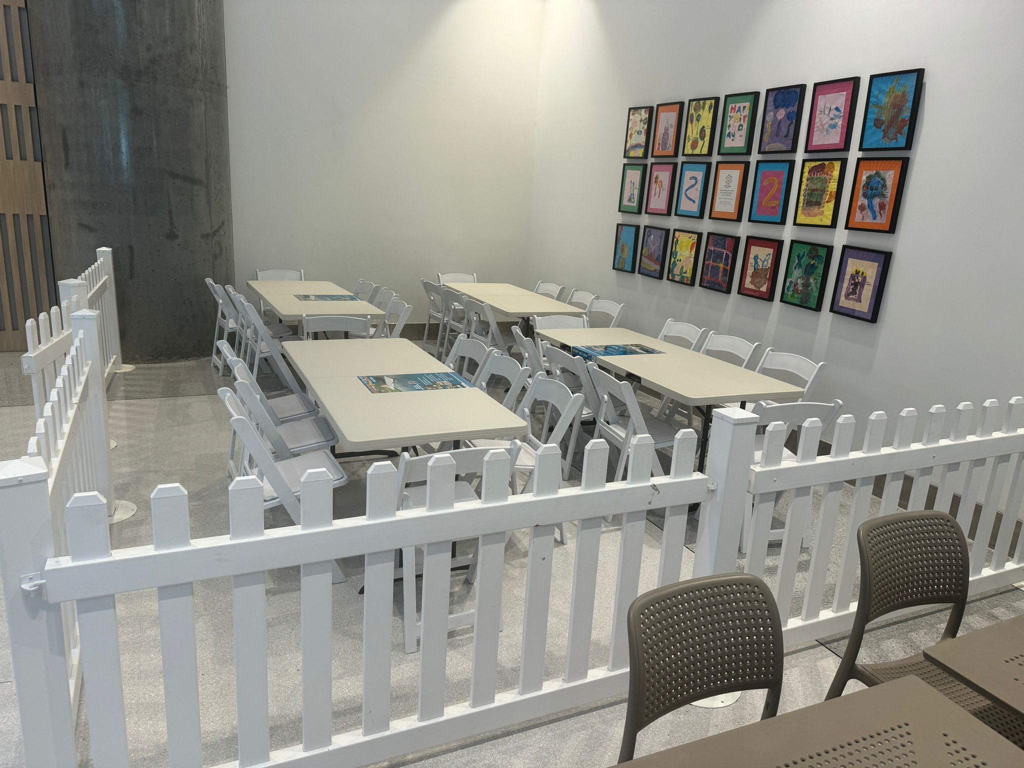 kids play section with with tables and chairs setup