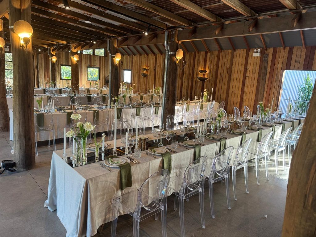 Wedding reception setup at a rustic vintage barn venue