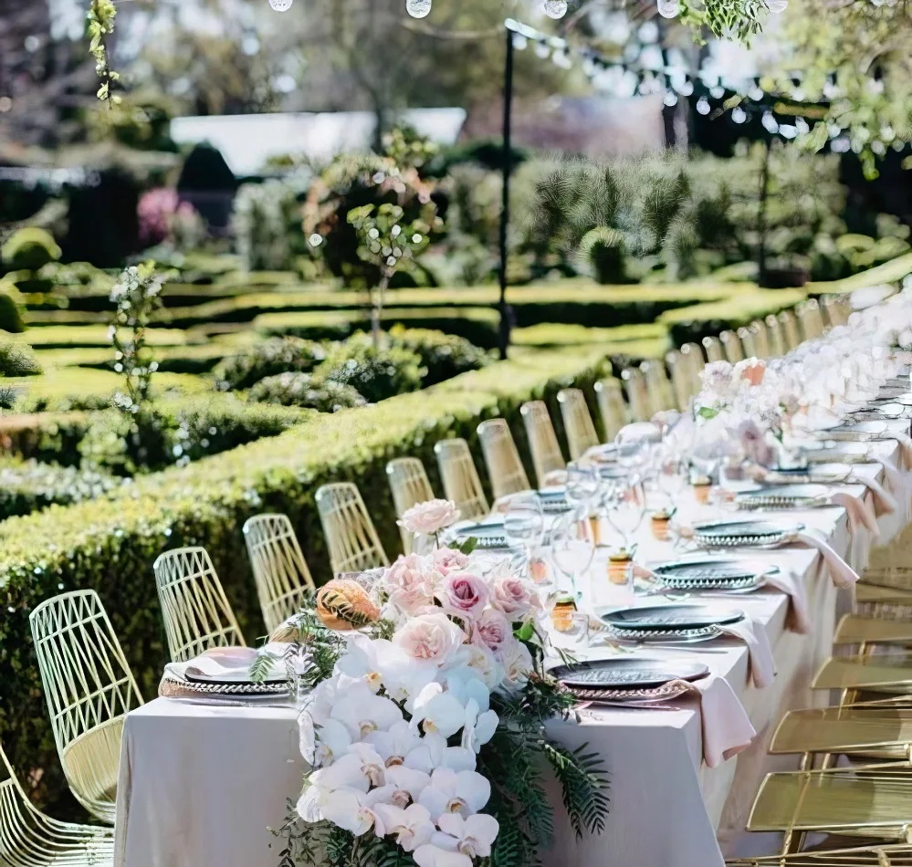 outdoor wedding reception with gold wire chair hrie