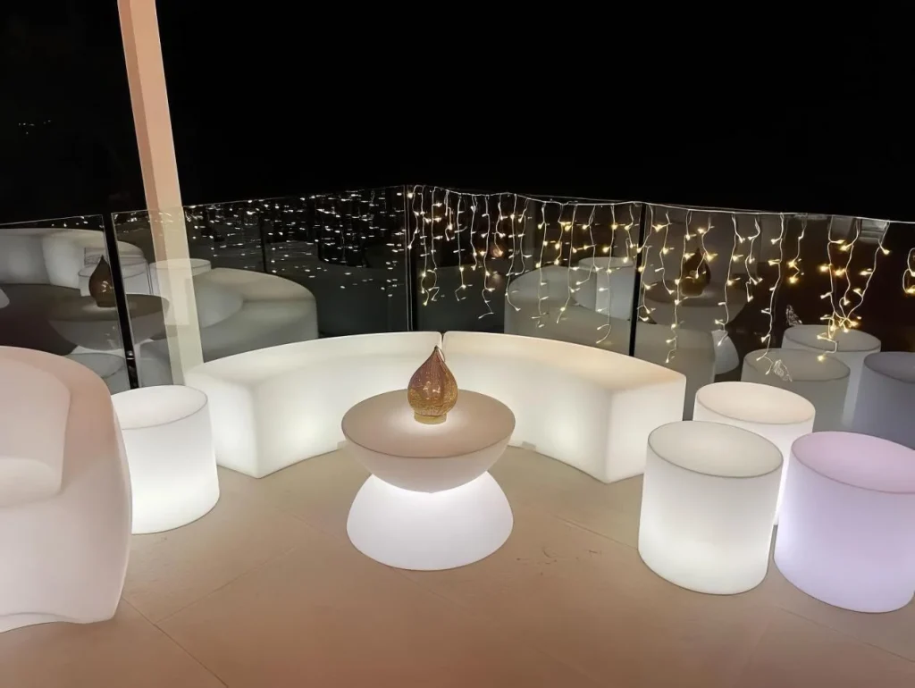 evening event with glow coffee tables, glow benches, and glow cube and cylinder seat