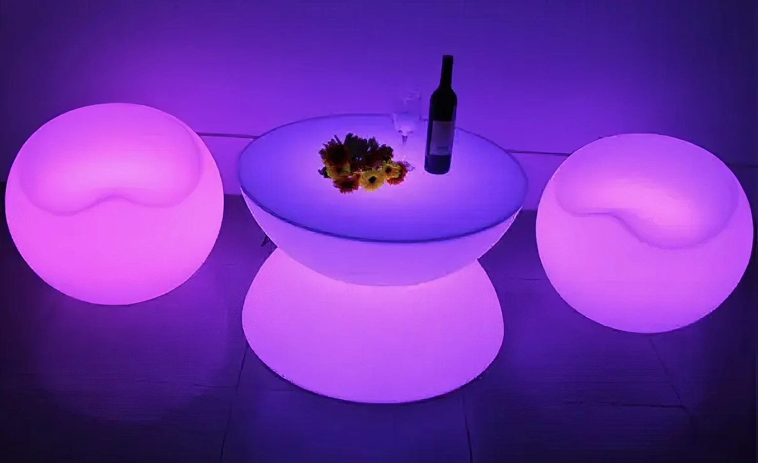 purple glow sphere chairs and yoyo coffee table at a glow party